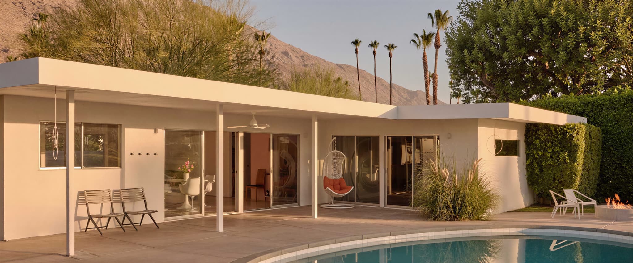 Modern vacation home exterior with pool